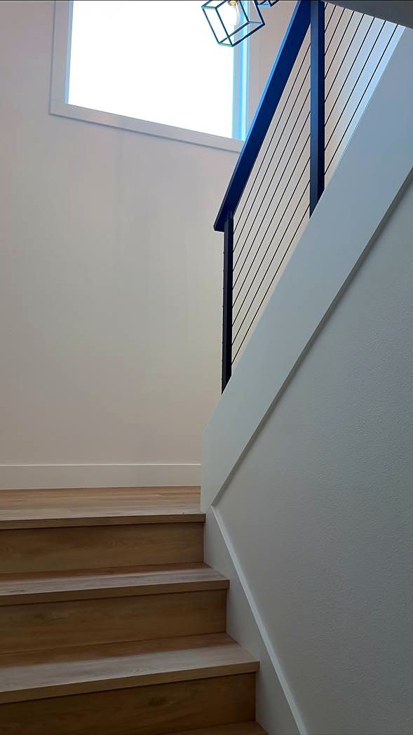 White oak treads with black cable railing