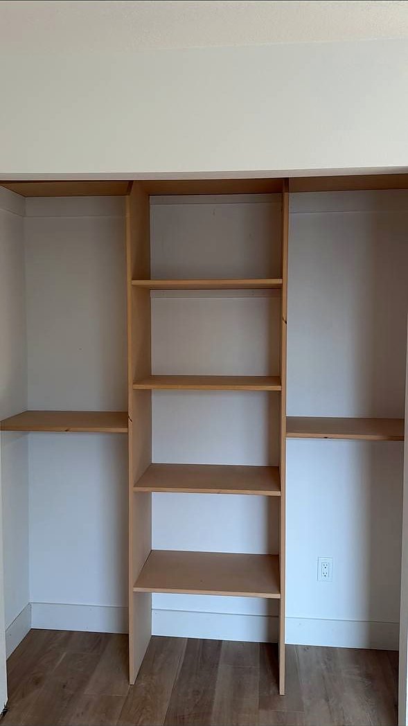 Closet shelving and hanging rods installed