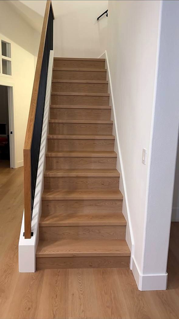 White oak stair treads with black balusters