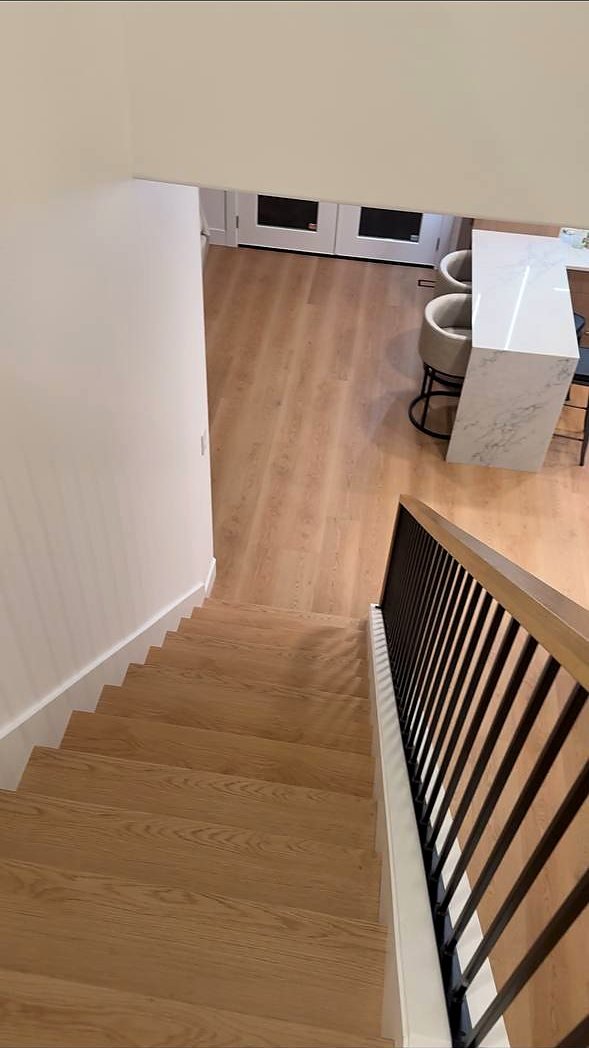 Stair overlook above an open kitchen