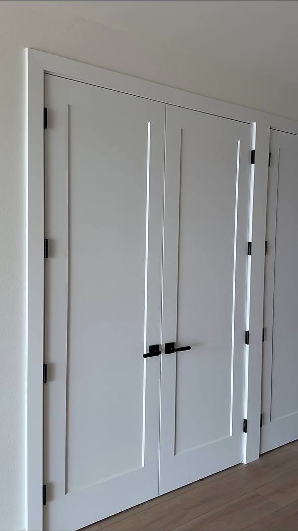 White double shaker doors with black hardware